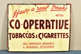 A VINTAGE ENAMEL SIGN 'Have a real smoke WITH CO-OPERATIVE TOBACCOS & CIGARETTES ALL MAKERS BRANDS &