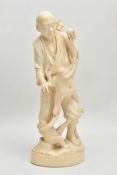 A LARGE JAPANESE MEIJI PERIOD IVORY OKIMONO, of a man standing holding a persimmon in his raised