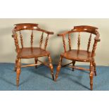 A NEAR PAIR OF LATE VICTORIAN ELM, WALNUT AND BEECH SMOKERS BOW CHAIRS, with dished seat on turned