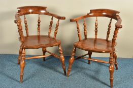 A NEAR PAIR OF LATE VICTORIAN ELM, WALNUT AND BEECH SMOKERS BOW CHAIRS, with dished seat on turned