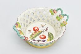 A DERBY PORCELAIN CIRCULAR BASKET, CIRCA 1760, each side with a pair of turquoise rope twist handles