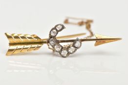 A DIAMOND ARROW BROOCH, designed as a crescent shape of seven old cut diamonds, attached to an arrow