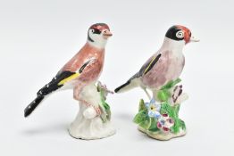 A NEAR PAIR OF BOW PORCELAIN FIGURES OF GOLDFINCHES, CIRCA 1760, modelled perched on floral