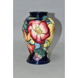 A MOORCROFT POTTERY GOLDEN JUBILEE VASE, of baluster form, tubelined daffodils, roses, thistles