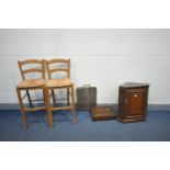 AN OAK PANELLED HANGING CORNER CUPBOARD, an oak gate leg table, an oak cutlery cabinet, brass fire