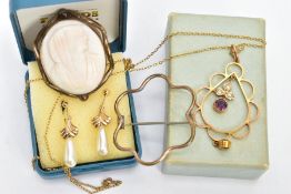 A YELLOW METAL AMETHYST AND SEED PEARL PENDANT NECKLACE AND TWO BROOCHES, the pendant of a tear drop