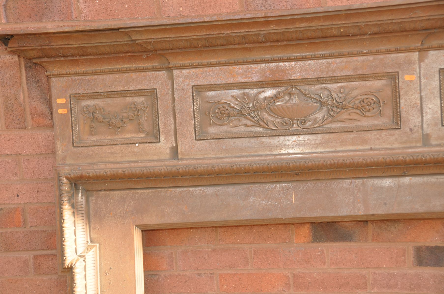 AN EDWARDIAN CAST IRON FIRE SURROUND with rope and swag with foliate detail lozenges to top - Image 2 of 4
