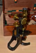 A MAHOGANY CASED SWIFT & SON BRASS CONSTRUCTION MICROSCOPE, with accessories