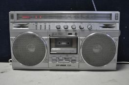 A SHARP GF-8989 radio cassette player (PAT pass and working)