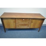 AN 'A YOUNGER LTD' TEAK CONCAVE SIDEBOARD, with double cupboard doors, flanking three graduated