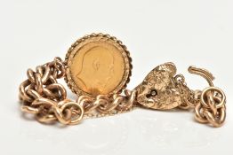 A 9CT GOLD CHARM BRACELET WITH A MOUNTED FULL SOVEREIGN COIN, curb link bracelet alternating links