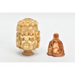 A CARVED IVORY SNUFF FLASK AND A CARVED BUDHA FIGURINE, the snuff flask possibly a 19th century