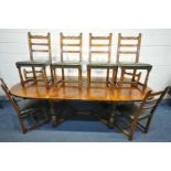 A GOOD REPRODUCTION OAK EXTENDING DINING TABLE, with rounded ends, two additional leaves, on four