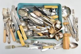 A TRAY OF ASSORTED LOOSE CUTLERY, to include two silver napkin rings, each with a full silver