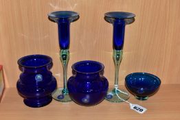 FIVE PIECES OF ROYAL COPENHAGEN COBALT BLUE CRYSTAL, comprising a pair of candle holders, height
