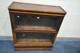 AN EARLY 20TH CENTURY OAK GLOBE WERNICKE SECTIONAL BOOKCASE, with two sections, with glazed up and