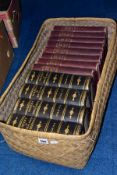 A BASKET CONTAINING TWELVE BOOKS, comprising eight cloth volumes of Cassell's History of England and