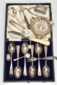 A CASED SET OF SILVER TEASPOONS, SUGAR TONGS, FORKS, THIMBLE AND OTHERS, to include a cased set of