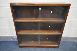A MID 20TH CENTURY 'MINTY LIMITED' THREE TIER SECTIONAL BOOKCASE, with glass sliding doors, width