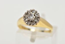 AN 18CT GOLD DIAMOND CLUSTER RING, comprising of nine round brilliant cut diamonds, approximate