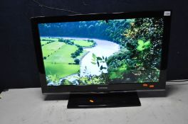 A SAMSUNG LE32C530F1W 32in TV with remote and stand but no screws to hold it in place (PAT pass