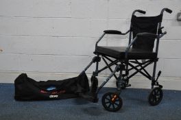 A DRIVE TRAVELITE WHEELCHAIR lightweight folding portable wheelchair with carry bag and seat pad