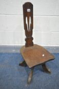 AN OAK SPINNING CHAIR, with a dish seat, height 77cm