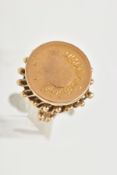 AN IRANIAN GOLD COIN RING, Iran gold half Pahlavi coin ring, the coin set in an ornate pierced