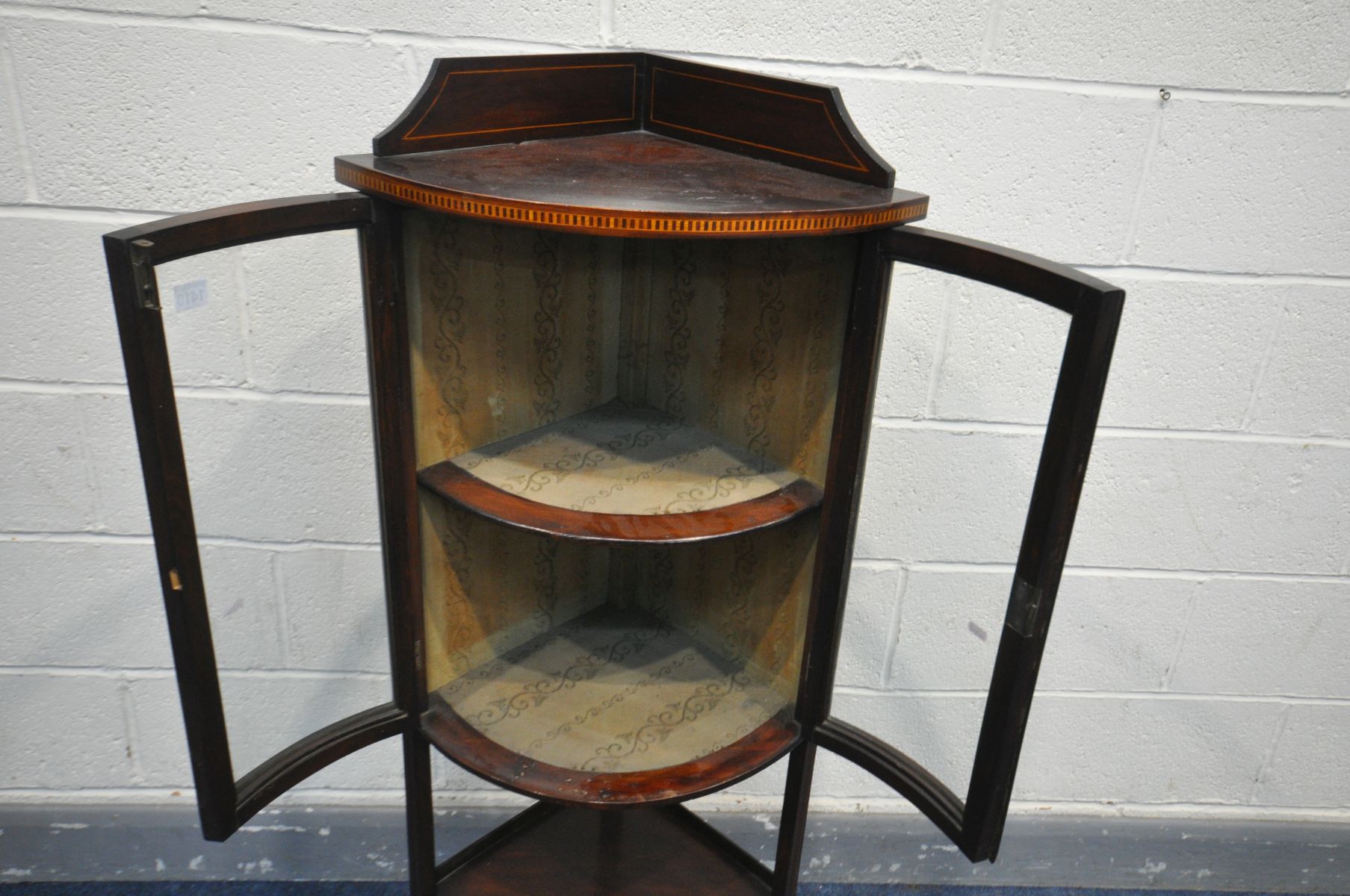 AN EDWARDIAN MAHOGANY DOMED GLASS TWO DOOR CORNER CUPBOARD, on square splayed legs, united by an - Image 2 of 2