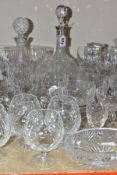A GROUP OF CUT CRYSTAL AND OTHER GLASS WARES, twenty nine pieces, to include a round decanter with