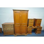 A YOUNGER CHERRYWOOD PIECE BEDROOM SUITE comprising three bedside cabinets, dressing table, width