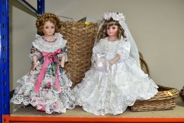 TWO COLLECTORS DOLLS AND THREE BASKETS, soft bodied dolls have a bisque head and limbs, one is a