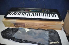 A CASIOTONE CT-660 electronic keyboard with original box and instruction manual and a Shark 2in1
