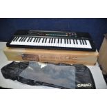 A CASIOTONE CT-660 electronic keyboard with original box and instruction manual and a Shark 2in1