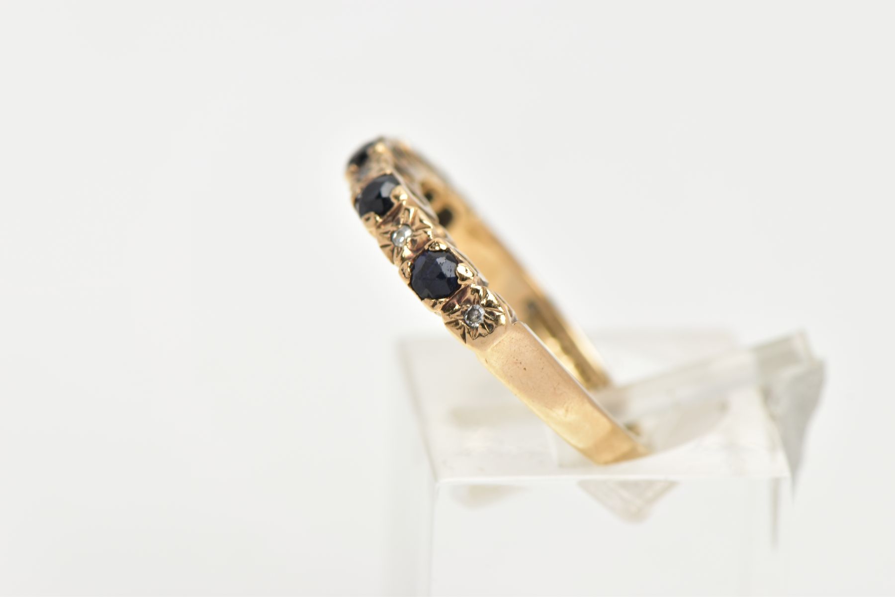 A 9CT GOLD SAPPHIRE AND DIAMOND HALF ETERNITY RING, designed with four circular cut deep blue - Image 2 of 4
