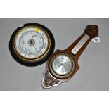 A CIRCULAR OAK CASED ANEROID BAROMETER, approximate diameter 23cm, together with an oak