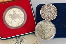 A PLASTIC BAG CONTAINING A 1977 BOXED SILVER PROOF CROWN (Handled) an 1887 Victoria Half-crown, a