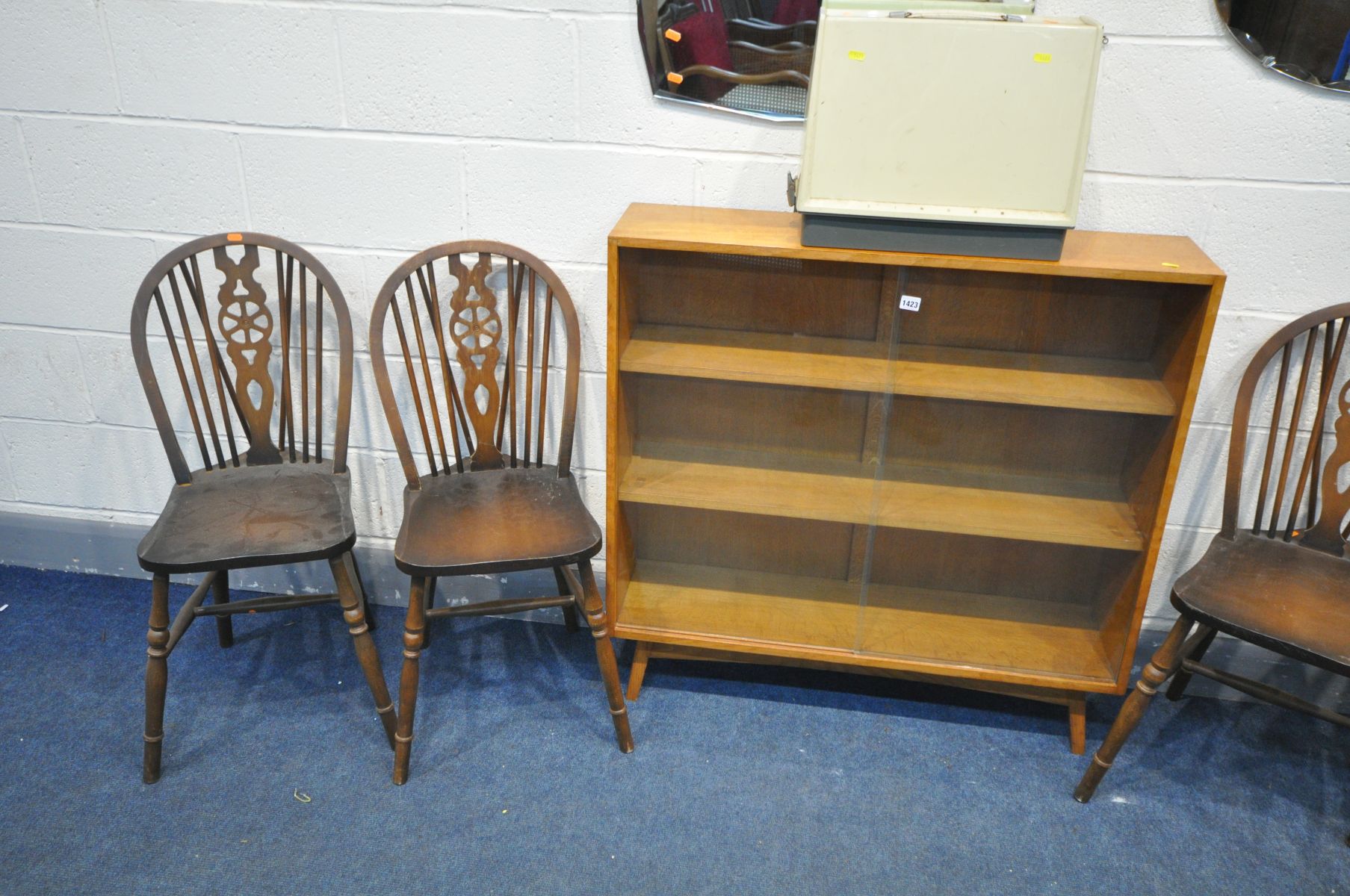 AN OAK GLAZED BOOKCASE, four wheel back chairs, three various wall mirrors and an electric singer - Image 3 of 3