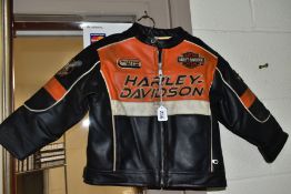 A CHILD'S FAUX LEATHER HARLEY DAVIDSON BIKERS JACKET, size 3T, bears label for Haddad, in well