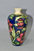 A MOORCROFT POTTERY PHEASANTS EYE VASE, of baluster form with a short cylindrical neck, with