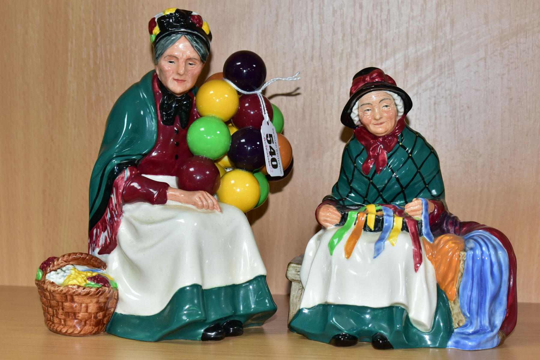 TWO ROYAL DOULTON FIGURINES, comprising Silks and Ribbons HN2017 and The Old Balloon Seller