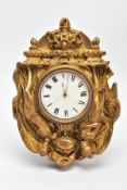 A POCKET WATCH CLOCK, a pocket watch encased in a decorative clock case, white dial with Roman