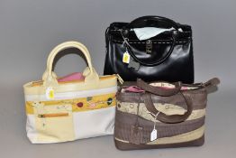 THREE RADLEY HANDBAGS, comprising a brown leather and printed beige canvas handbag, a black