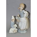 TWO LLADRO FIGURINES, comprising no 4835 Girl with Lamb, designed by Juan Huerta, issued 1972-