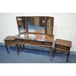 A STAG MINSTREL DRESSING TABLE with triple mirrors and three drawers, width 120cm x depth 50cm x