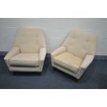 A PAIR OF MID CENTURY PARKER KNOLL MODEL PK970/1 UPHOLSTERED ARMCHAIRS, on teak legs (re upholstered