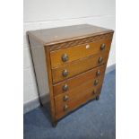 AN OAK CHEST OF FIVE LONG DRAWERS, width 77cm x depth 42cm x height 101cm (condition:-the top with