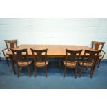 A CHERRYWOOD EXTENDING DINING TABLE, three additional leaves, with canted corners, on square tapered