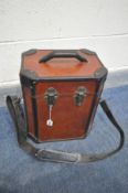 A BROWN LEATHER WRAPPED WINE BOTTLE CARRY CASE, possibly made by 'Coach house', enclosing room for