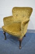 AN EARLY 20TH CENTURY MAHOGANY TUB CHAIR, on cabriole legs